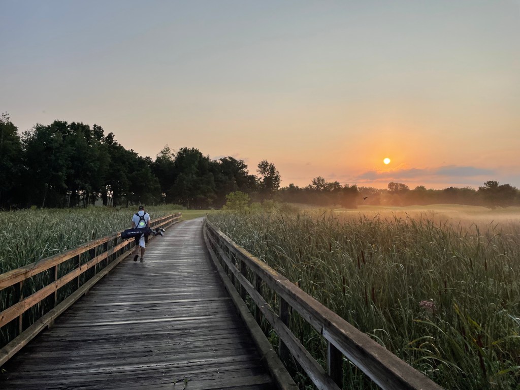 bridge at the course at sunset