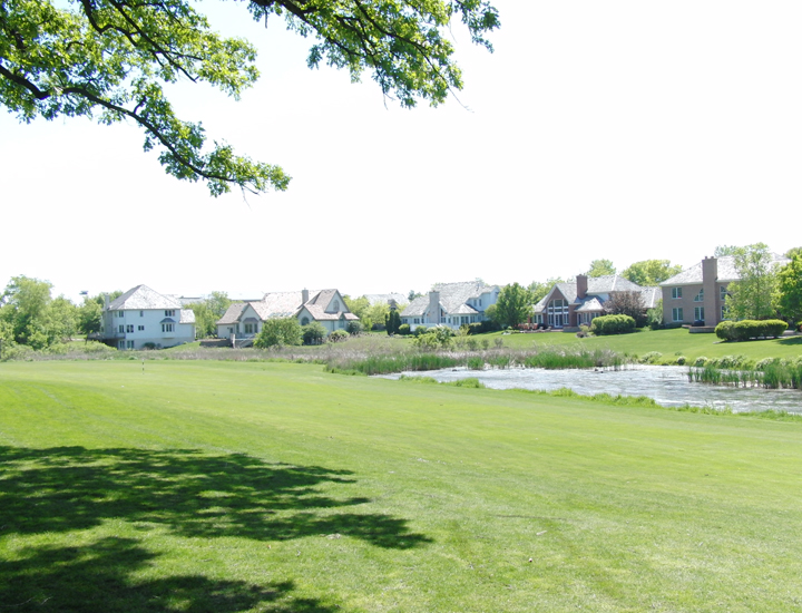 fairway with houses in the background