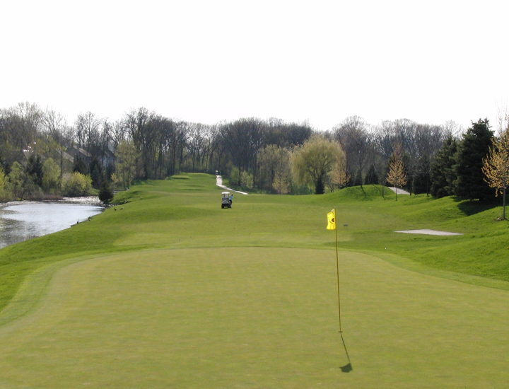 green with yellow golf flag